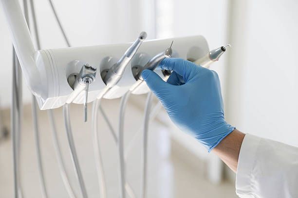 Professional Tooth Extraction technician working in Harrisonburg, VA